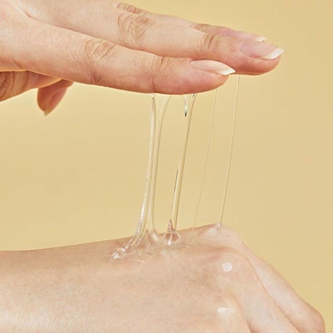 COSRX Advanced Snail 96 Mucin Power Essence showing texture while applying on skin