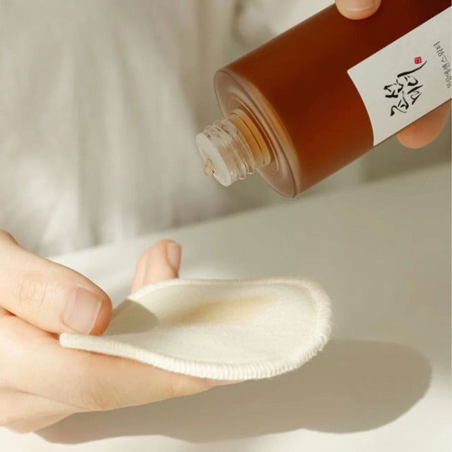 Person applying Beauty of Joseon Ginseng Essence Water 