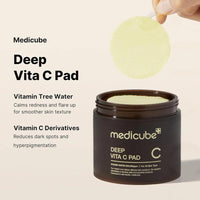 Medicube Deep Vita C Pad with jar and application on beige background
