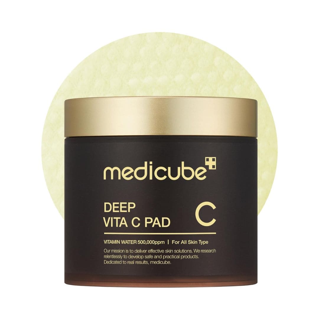 Medicube Deep Vita C Pad with gold lid on a white background