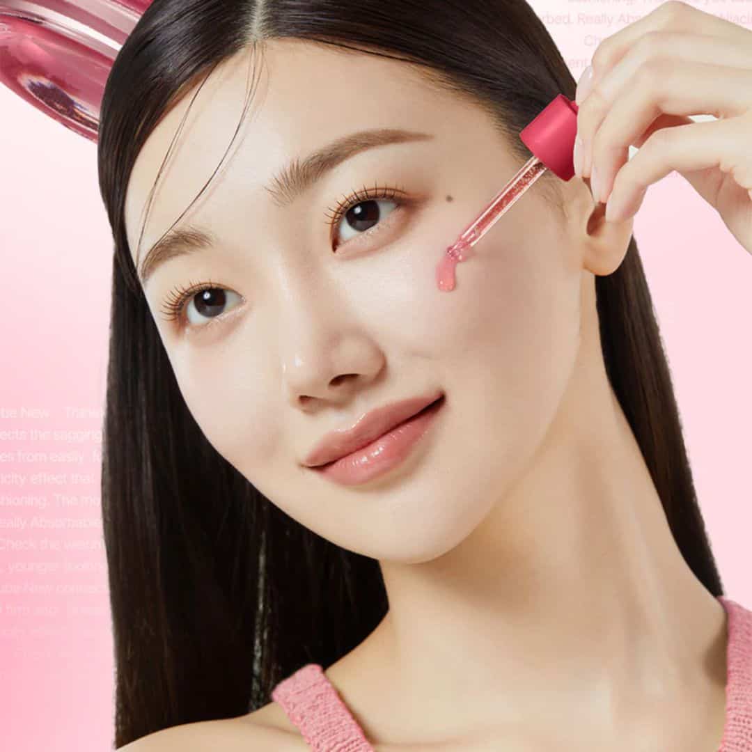 Person applying Medicube TXA Niacinamide 15 Serum 