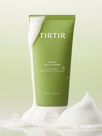 Green TIRTIR matcha pack cleanser tube with white foam on a light green background