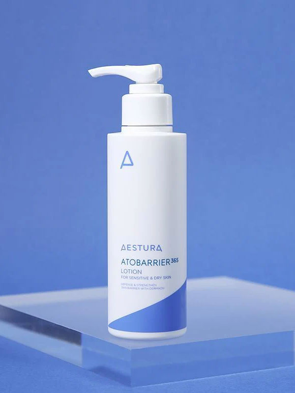 Aestura Atobarrier 365 lotion bottle on a blue background