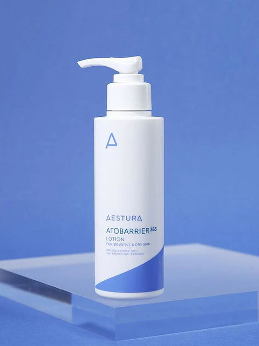 Aestura Atobarrier 365 lotion bottle on a blue background