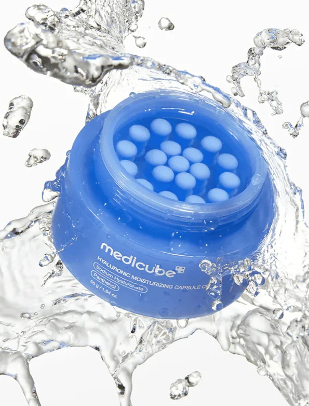  Medicube hydrating moisturizing capsule with water droplets around it